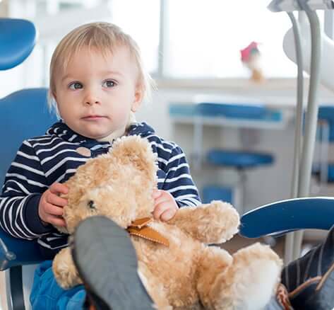 young boy in dental chair
